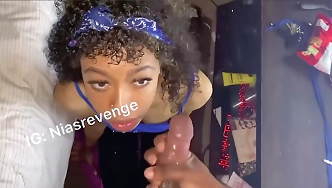 Ebony babe takes a deep blowjob on the bed to have fun