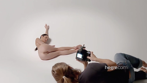 Ebony babe is getting on her knees and giving the cast host a blowjob