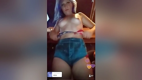 Ebony stripper strips and shows her big tits in the camera