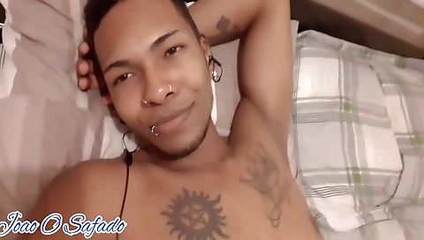 Ebony with tattooed face is playing with her pussy