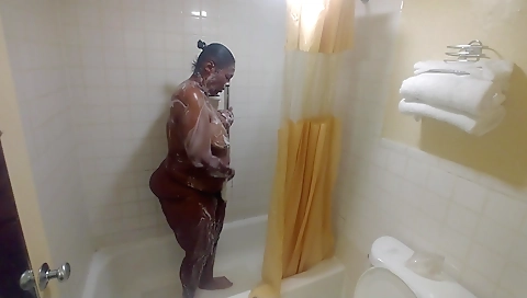 Amateur ebony takes shower in one piece of her body