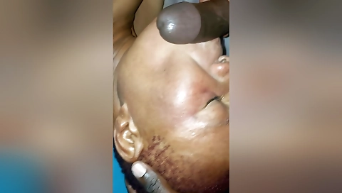 Ebony woman with a large black dick enjoys watching you suck