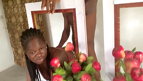 Ebony babe with big tits and tattooed face fucks a guy