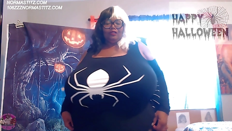 Busty brunette with a big and round ass plays with her hair