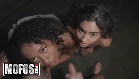 Ebony slut with a large ass is getting fucked by two men