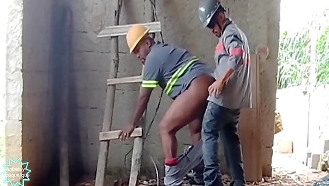 Two blacks in black shorts and tights are doing anal sex